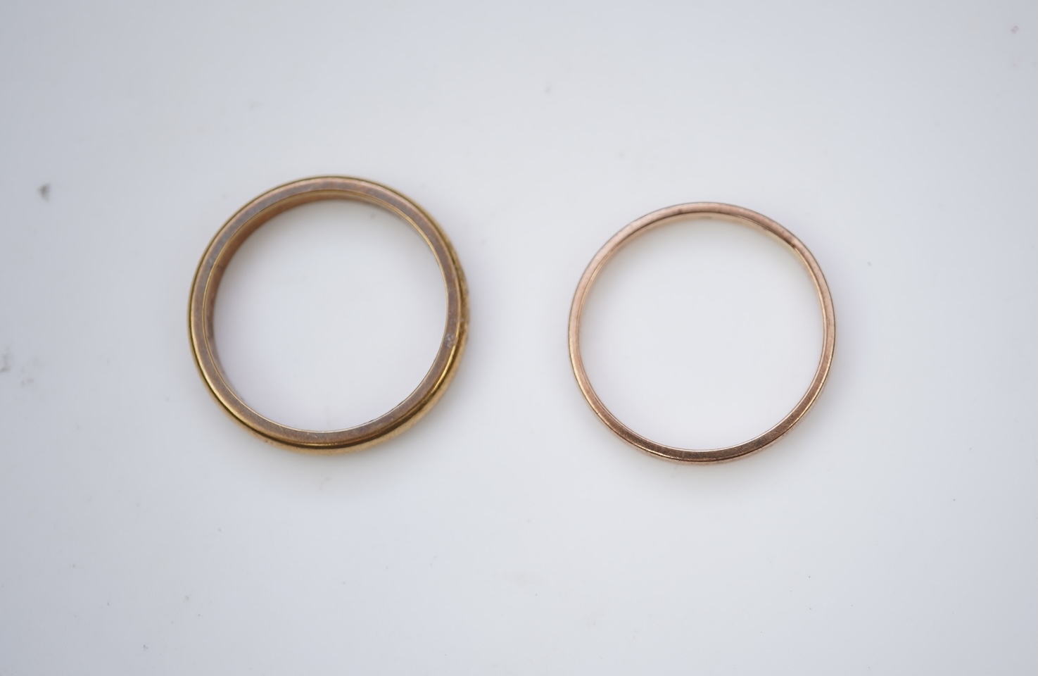 Two gold wedding bands